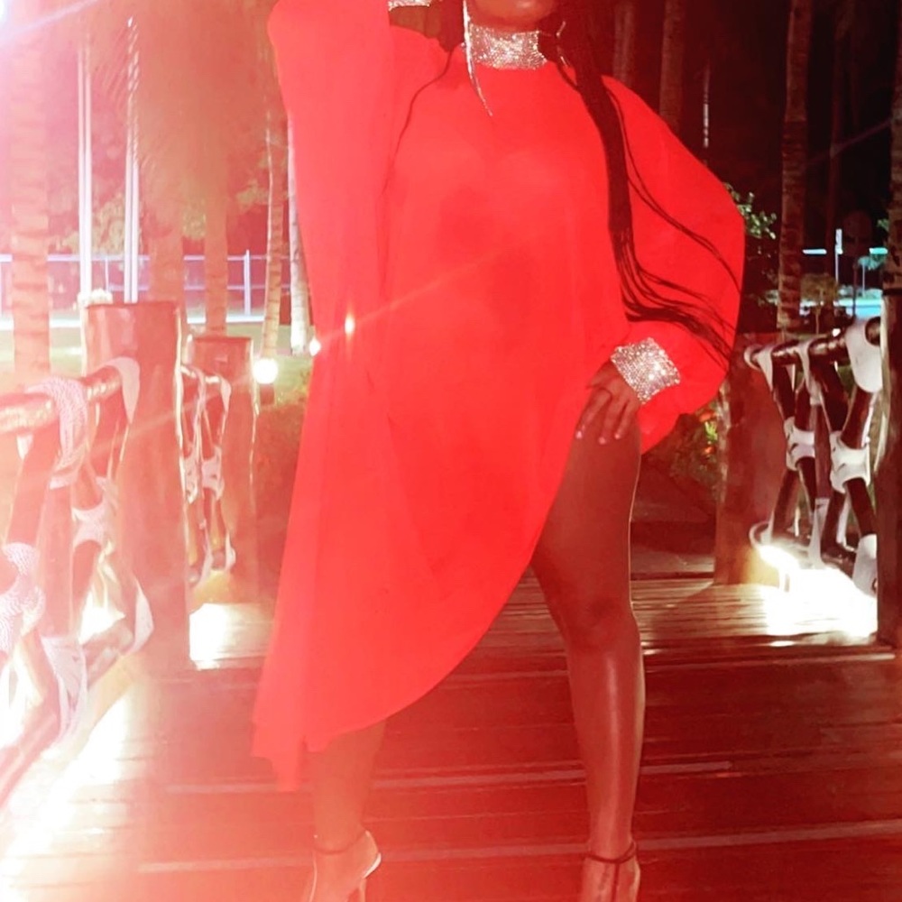 Red sheer cover up/ dress with rhinestone trim.